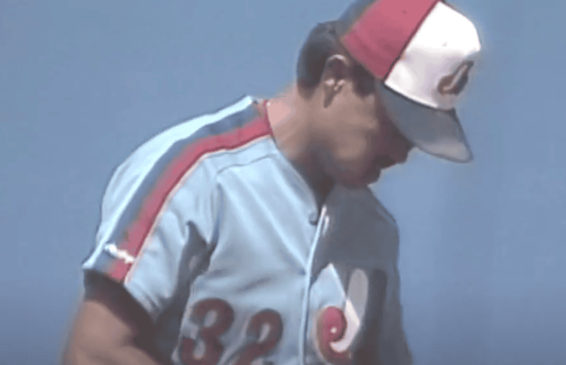 This image showcases Dennis Martinez delivering his iconic curveball pitch.